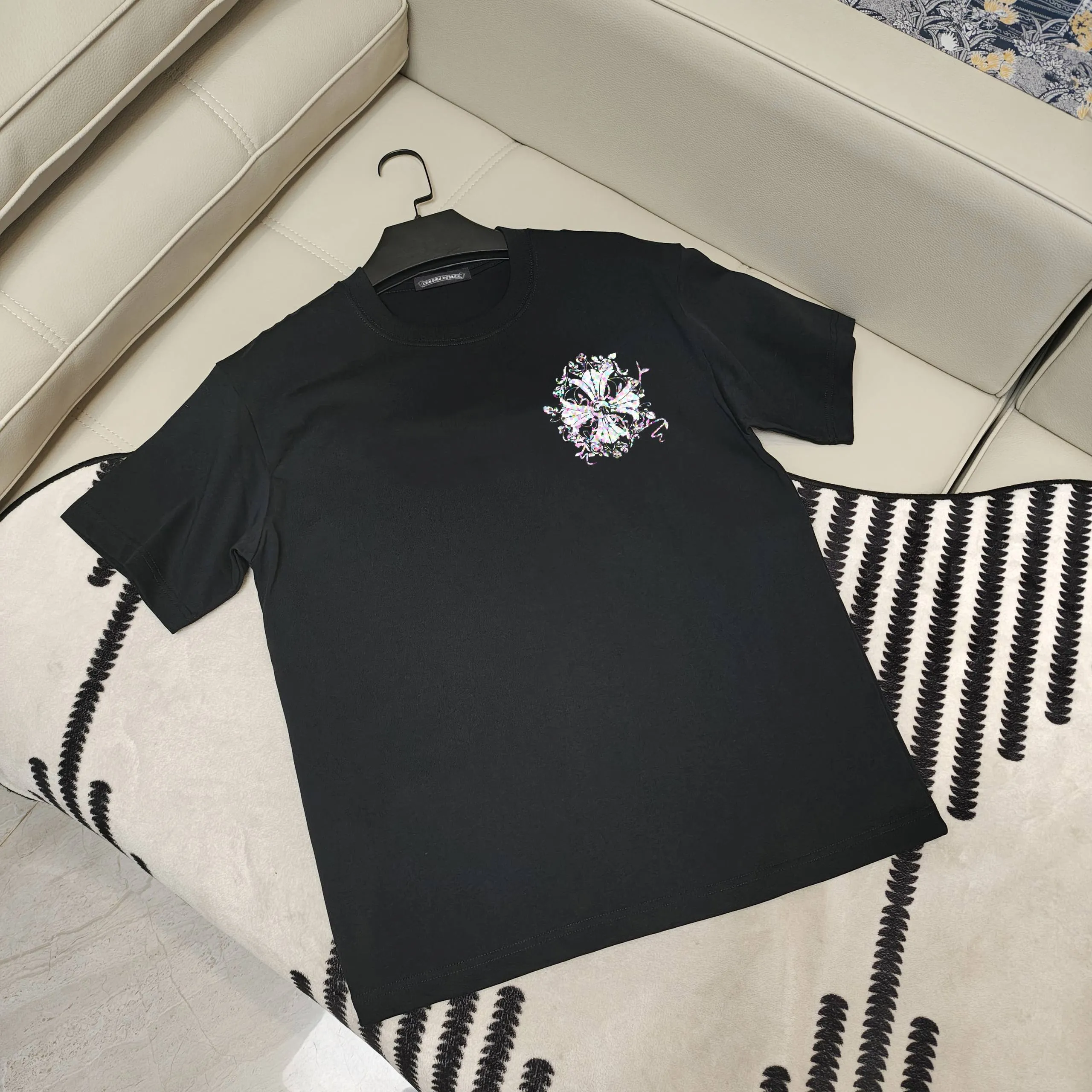🅿️190 Crow Heart’s new summer T-shirt! This Sanskrit cross printed round neck short sleeves is simply a must-have for fashionistas. Salona cotton fabric is super comfortable, soft and skin-friendly, and has excellent breathability, making it perfect for summer wear. The Sanskrit cross print design on it is amazing, full of mystery and high-end, and the details are so exquisite that it makes people scream. It is worthy of Kroxin, and it vividly interprets the trend and personality. The loose fit is super friendly to all body shapes, covers the flesh and is comfortable, and looks good no matter how you wear it. Pair it with jeans and you'll look cool on the street. Pair it with sweatpants and you'll instantly look energetic and trendy. When you wear it and go out, you will feel like you are the spokesperson of fashion, and it will definitely turn heads. Color: Black White Red Size: S-2XL